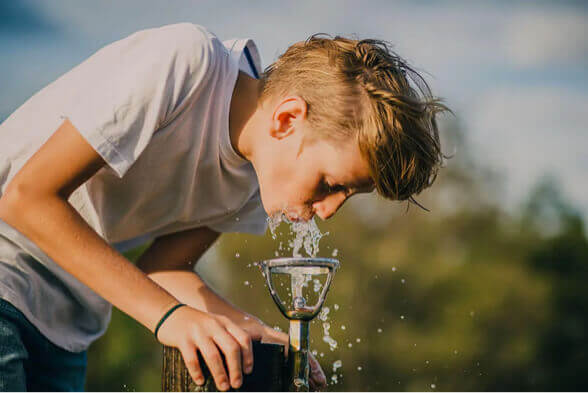 http://boy%20drinking%20from%20water%20fountain